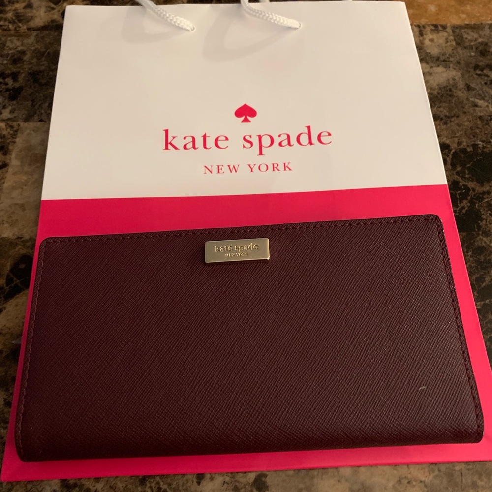 New Kate Spade Wallet. Color: Deep Plum